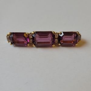 Signed Christian Dior Amethyst color crystal glass Brooch with rhinestones.
